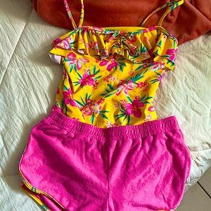 Matching bathing suit peace KIDS shorts and in a size 12 by the brand bmagical